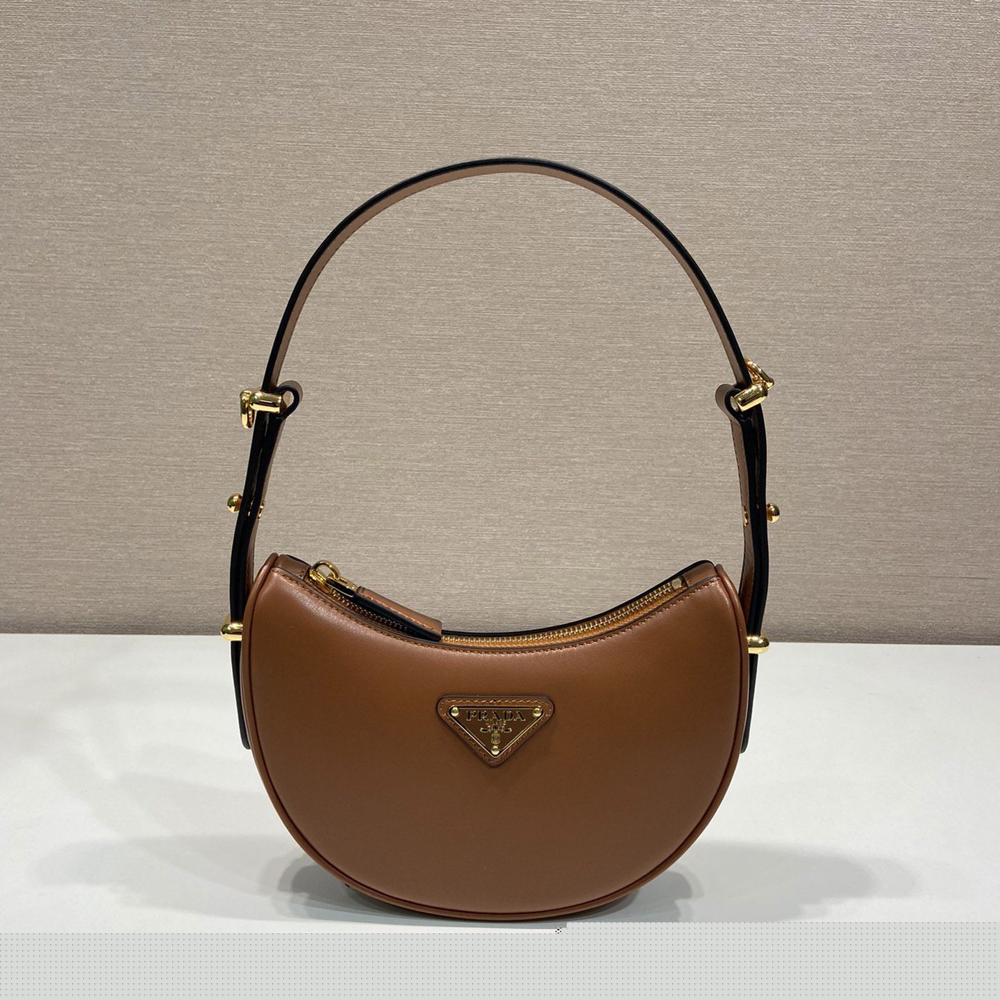 Pra*a top handle bags